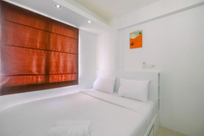 Simply Cozy 2BR Bassura City Apartment By Travelio